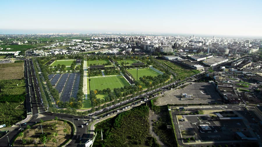 Aerial masterplan of a football training complex with solar-canopy parking and pitches