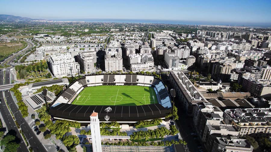 Wide aerial render of a football stadium with the coastline in the distance